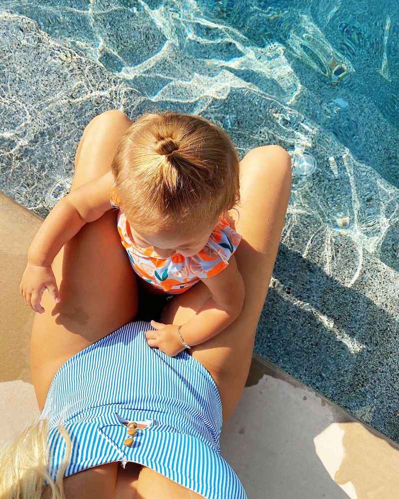 Kayla Rae Reid and Daughter in Swimming Pool