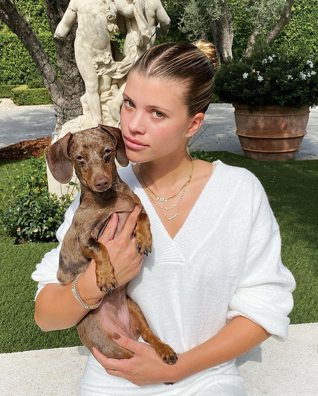 Sofia Richie Stuns In PrettyLittleThing Posing With Her Dog