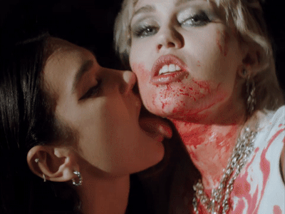 Miley Cyrus Tells ‘All My Exes’ to ‘Eat S--t’ in ‘Prisoner’ Music Video With Dua Lipa