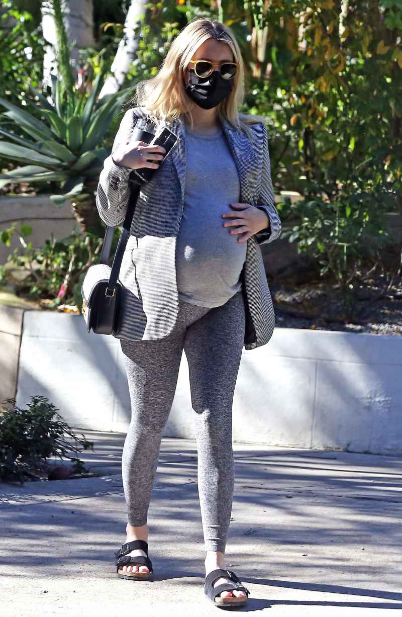 See Pregnant Emma Roberts Cradling Baby Bump While House Hunting