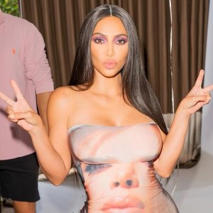 Kim Kardashian Wears a Figure-Hugging Dress With Her Face on It