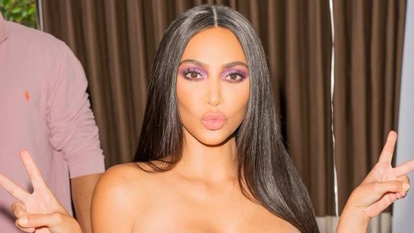 Kim Kardashian Wears a Figure-Hugging Dress With Her Face on It