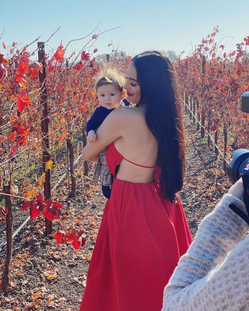 Nikki Bella and Artem Chigvintsev Celebrate 1st Christmas With Son Matteo in Holiday Card