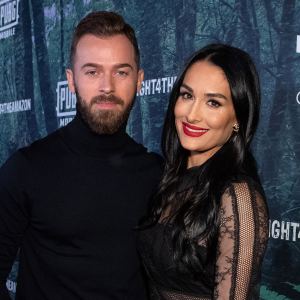 Nikki Bella and Artem Chigvintsev Celebrate 1st Christmas With Son Matteo in Holiday Card