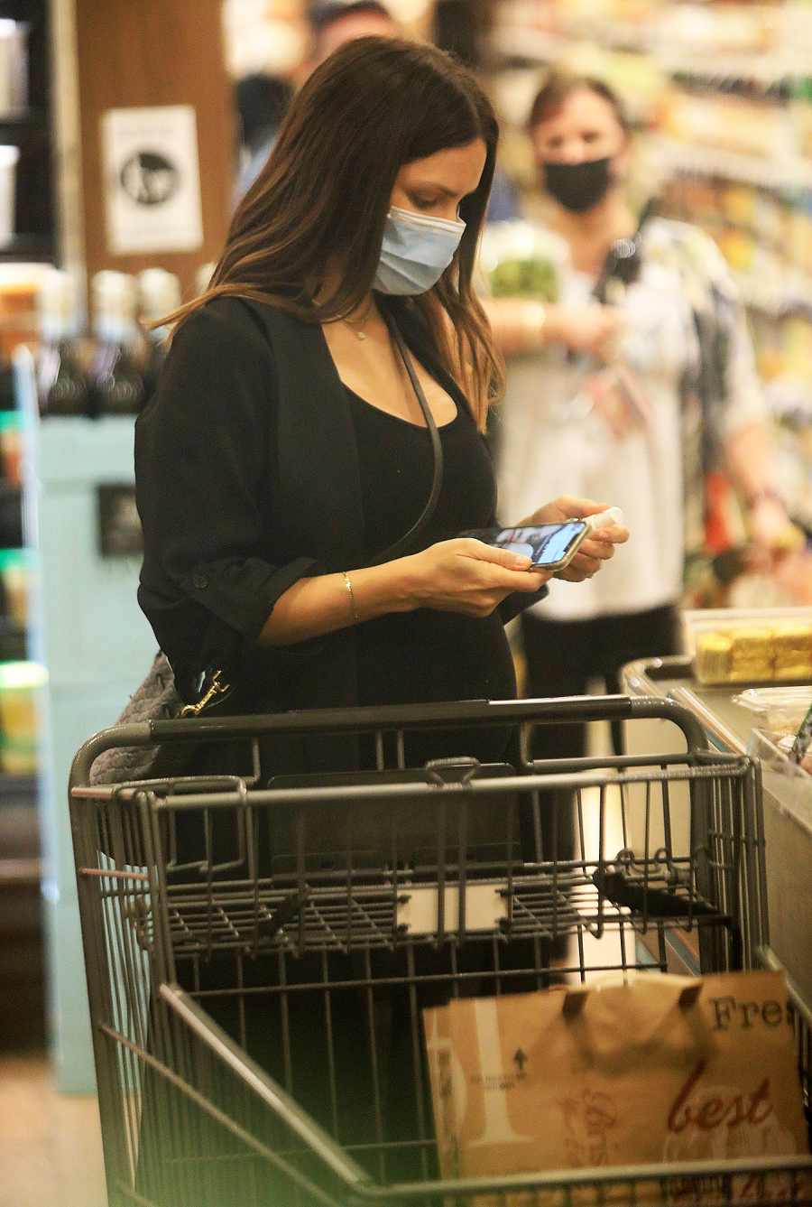 Pregnant Katherine McPhee Covers Baby Bump While Grocery Shopping