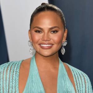 You’ll Never Guess the Meaning Behind Chrissy Teigen's Sexy Spine Tattoo