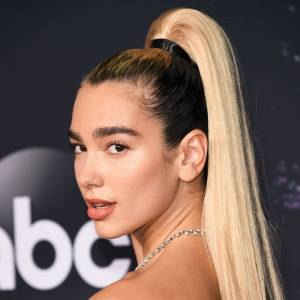 Dua Lipa Looks Unrecognizable in a Short Blonde Wig on U.K. ‘Vogue' Cover