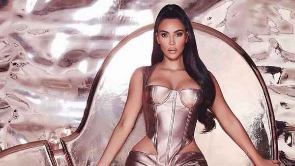Kim Kardashian Shows a Little Skin in a Butt-Baring Jumpsuit for the KKW Fragrance Promo