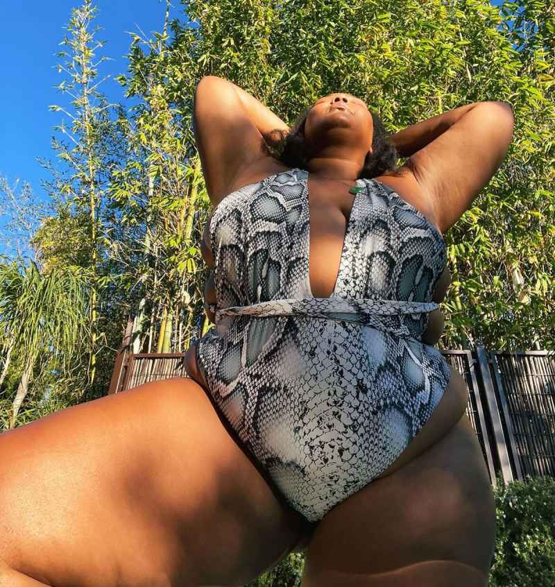 Lizzo Shows Off Her Curves in a Plunging Snakeskin Swimsuit