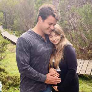 Pregnant Bindi Irwin and Chandler Powell Cradle Her Baby Bump in Sweet Shot: Pic