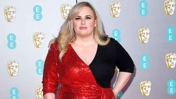 Rebel Wilson Recalls Being Kidnapped Held at Gunpoint in Africa Red and Black Dress