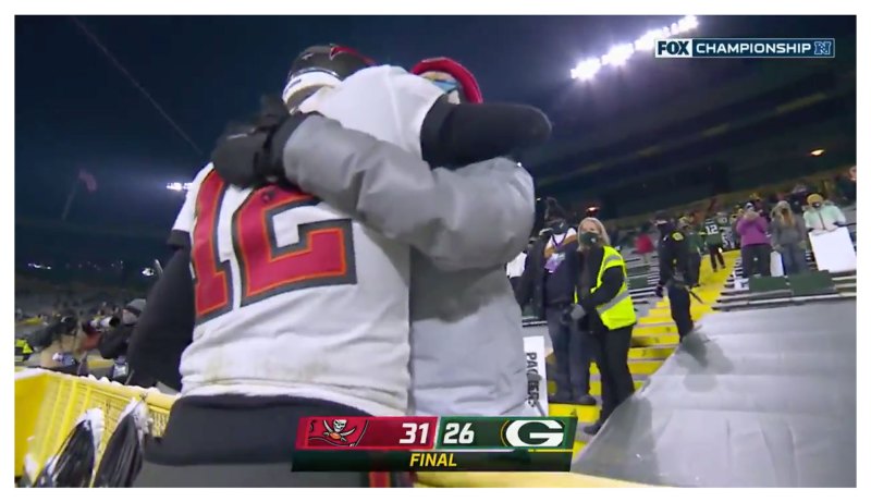 Tom Brady hugs son Jack after winning the NFC Championship