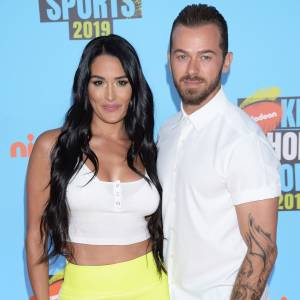 Why Nikki Bella Hid Postpartum Depression From Artem Chigvintsev