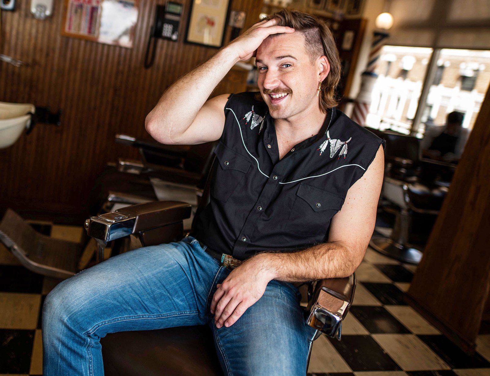 Morgan Wallen poses for a portrait after getting a mullet at Paul Mole Barber Shop Who Is Morgan Wallen 5 Things to Know About the Scandal-Ridden Country Singer