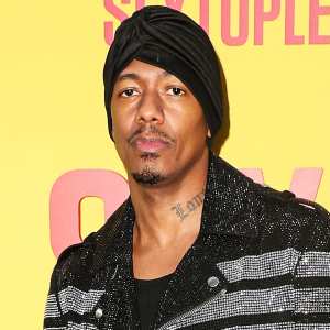 Nick Cannon Tests Positive COVID-19 Steps Back Masked Singer Host