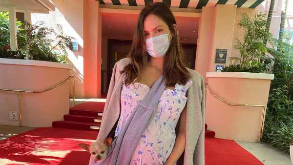 Pregnant Katharine McPhee Cradles Her Growing Baby Bump While Toting Her Dog
