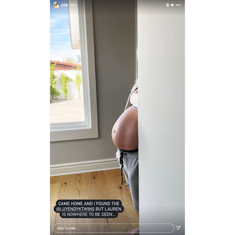 Pregnant Lauren Burnham Bump peeking out from doorways