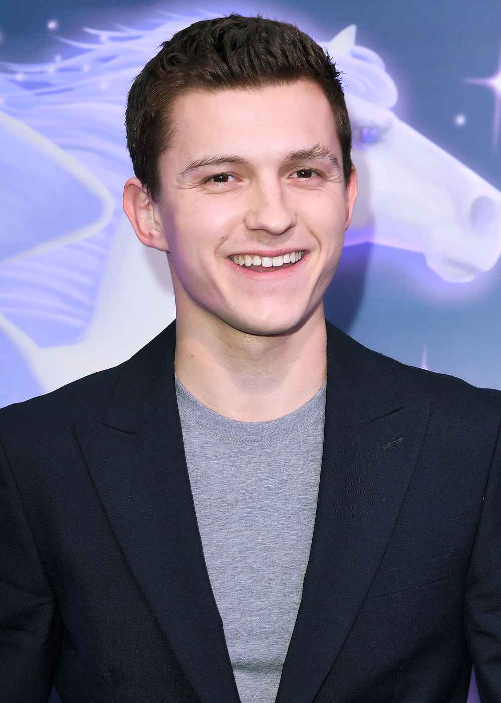 Tom Holland Flashes Shaved Legs in Pantsless Interview: Watch