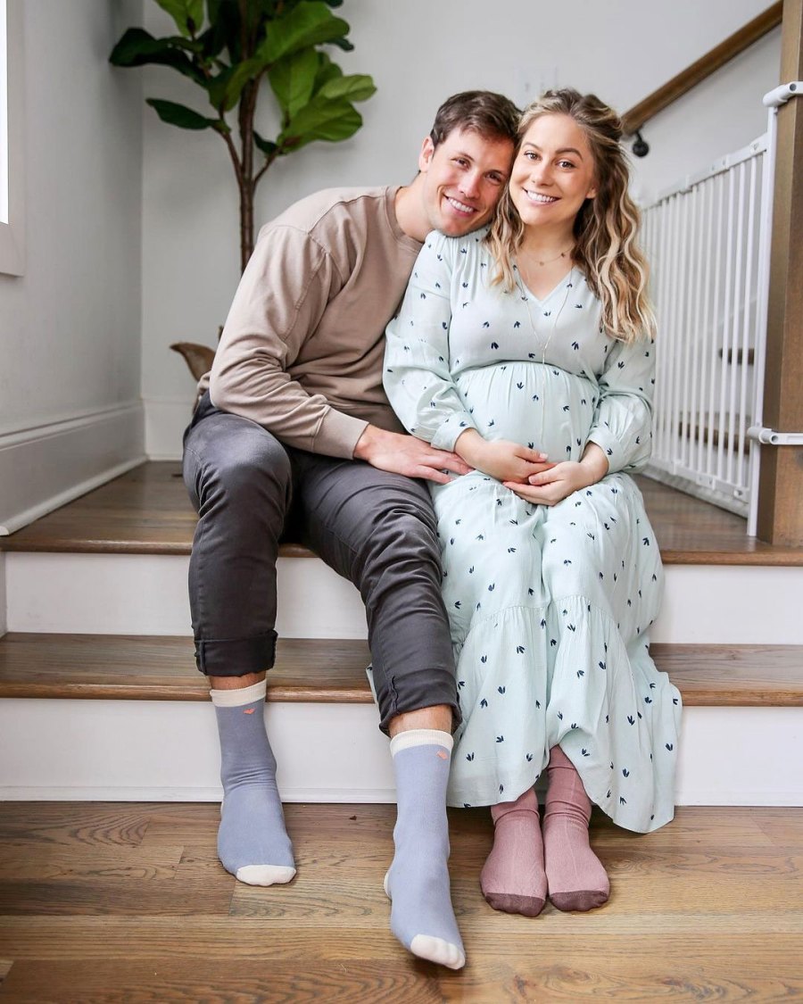 Andrew East and Pregnant Shawn Johnson Sitting on Stairs