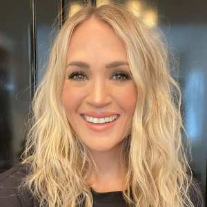 Carrie Underwood Rings in 38 With Husband and Sons