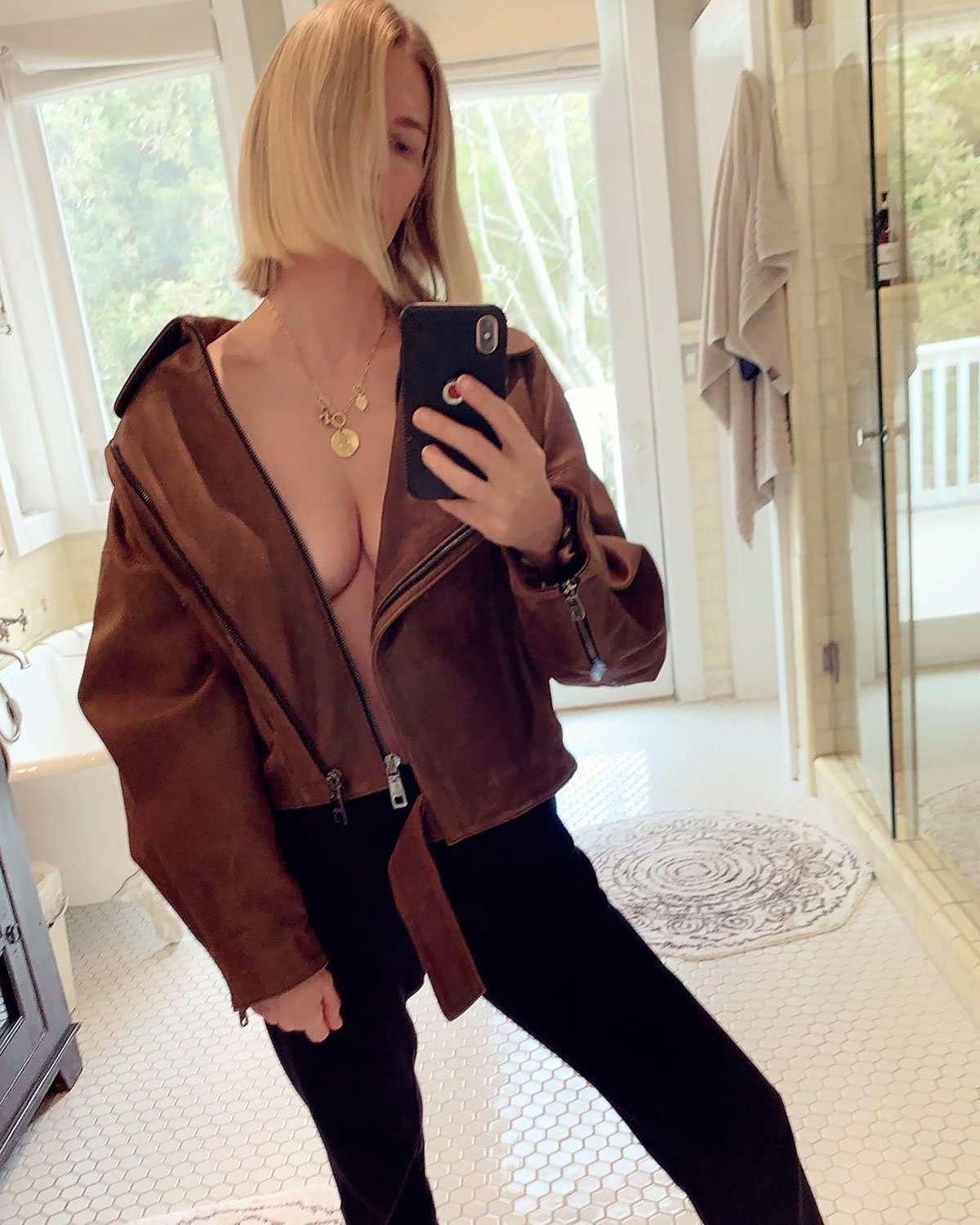 January Jones Contemplates Her Outfit Choice in Topless Instagram
