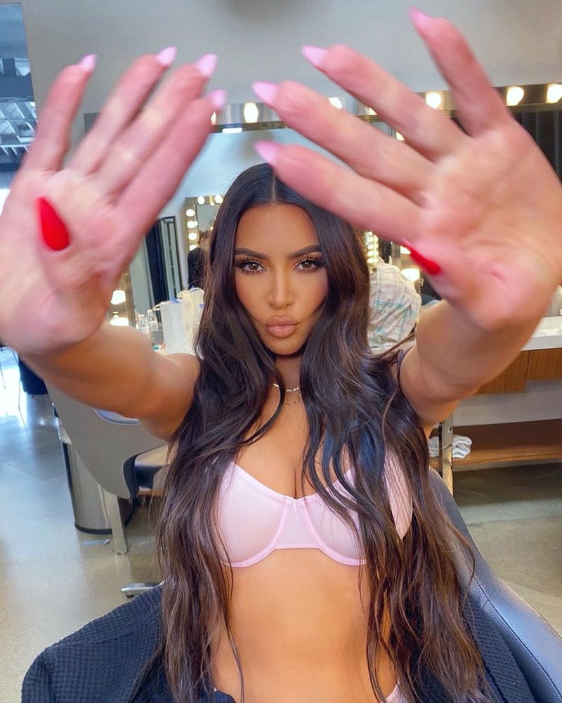 Kim Kardashian Shares Sexy Behind-the-Scenes Snap in Skims Bra