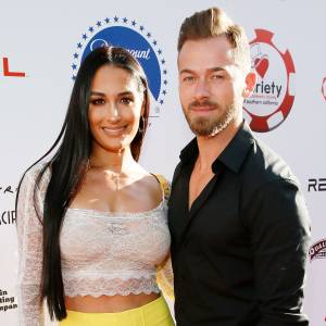 Nikki Bella and Artem Chigvintsev attend the 9th Annual Variety Charity Poker and Casino Night in 2019 Nikki Bella Wants Another Baby With Artem Chigvintsev But Also Wants a WWE Comeback