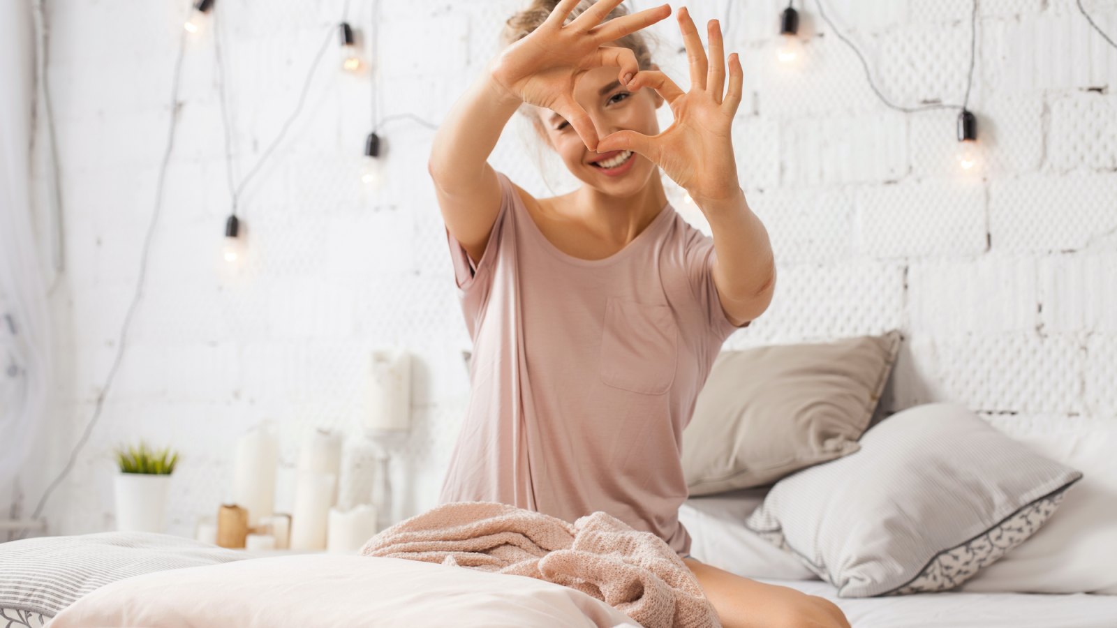 Woman-In-Bed-In-PJs-Stock-Photo