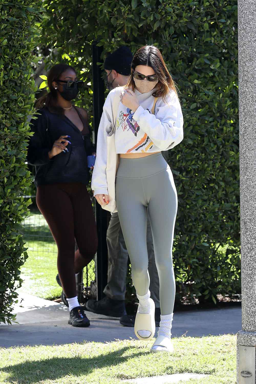 Kylie Jenner Styles Yeezy Slides for Fall in a Furry Coat & Mom Jeans –  Footwear News