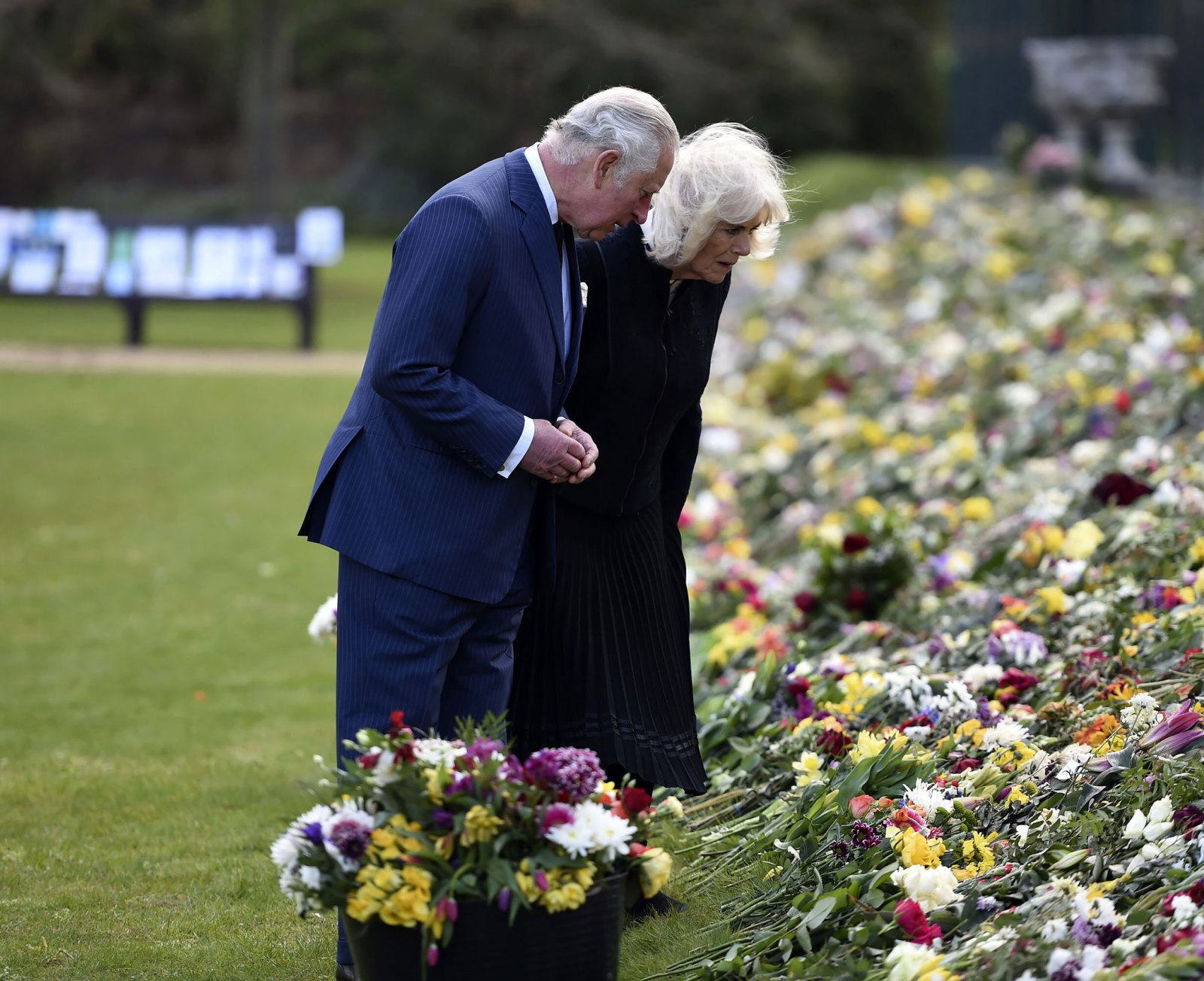 Prince Charles, Camila Pay Their Respects to Philip at Memorial Garden
