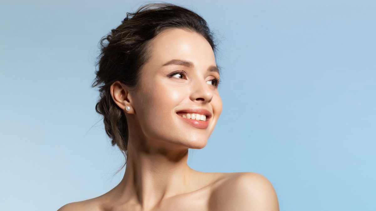 Woman-With-Glowing-Skin-Stock-Photo