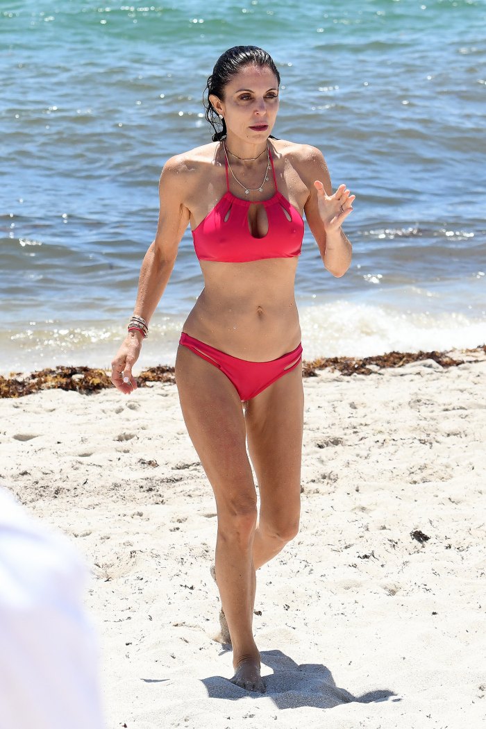 Bethenny Frankel shows off a fit body in a hot pink cropped bikini