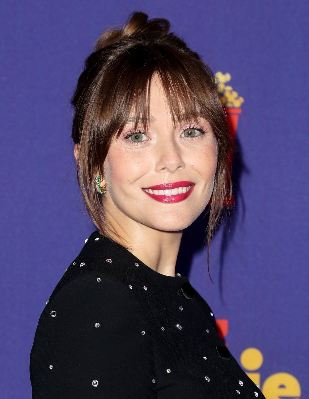 How Elizabeth Olsen Got Her Gorgeous Brunette &lsquo;Do at the 2021 MTV Awards