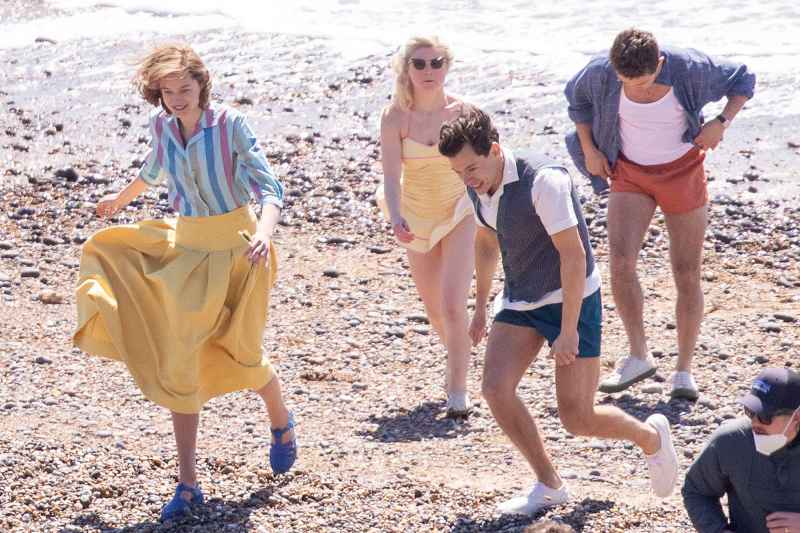 Harry Styles Emma Corrin and David Dawson Skip Down the Beach on My Policeman Set 3