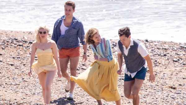 Harry Styles Emma Corrin and David Dawson Skip Down the Beach on My Policeman Set 4