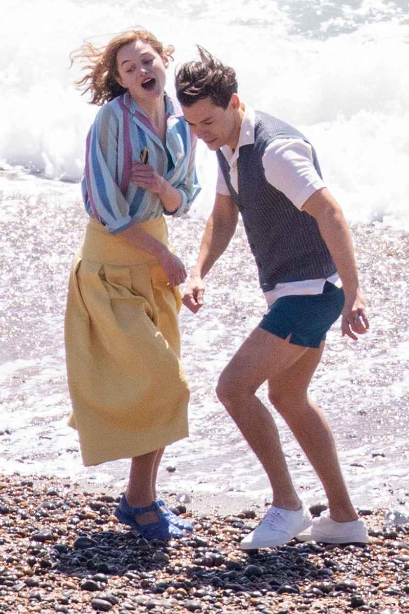 Harry Styles Emma Corrin and David Dawson Skip Down the Beach on My Policeman Set