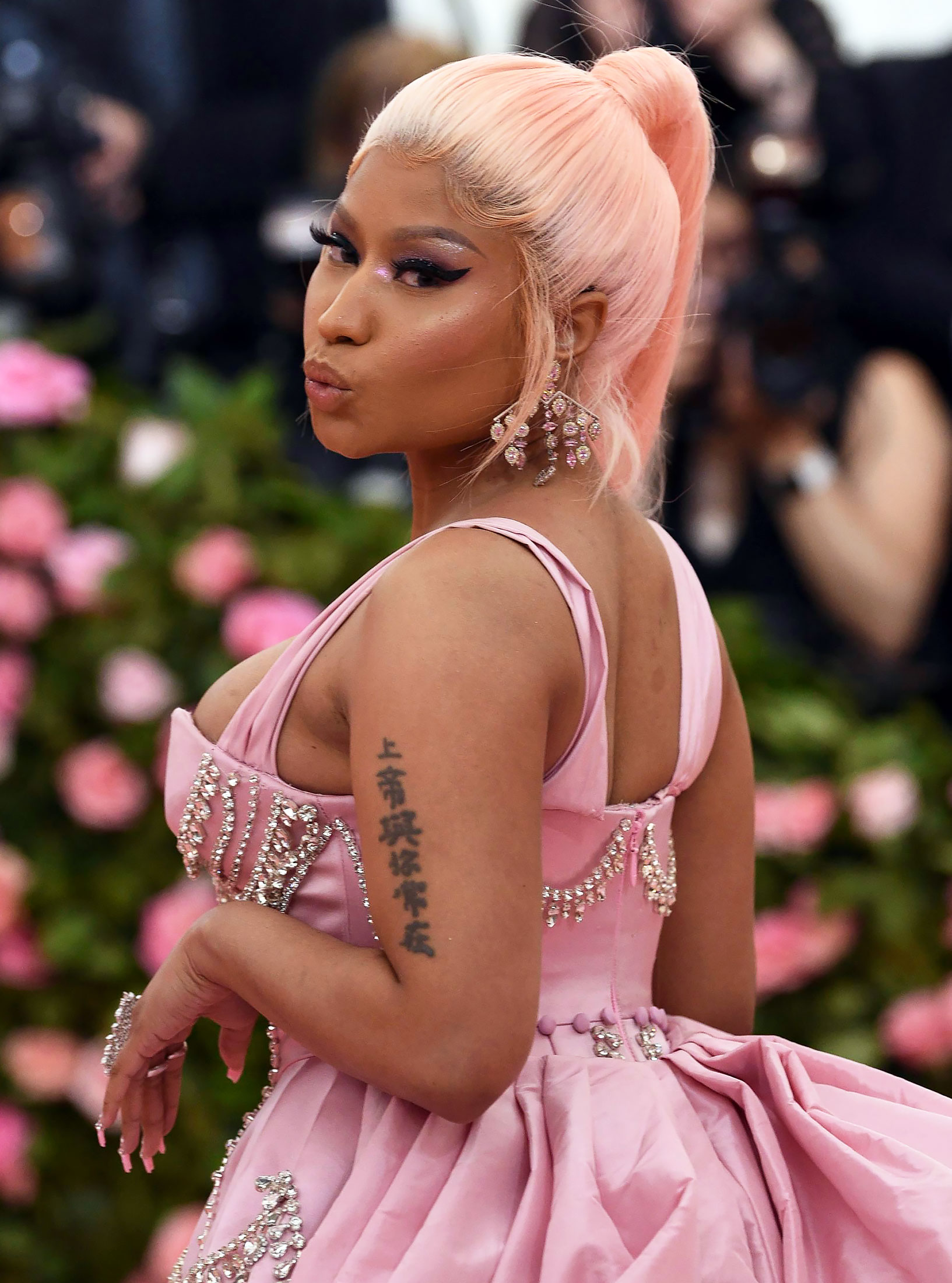 Nicki Minaj Strips Down to Nothing But Bedazzled Pink Crocs