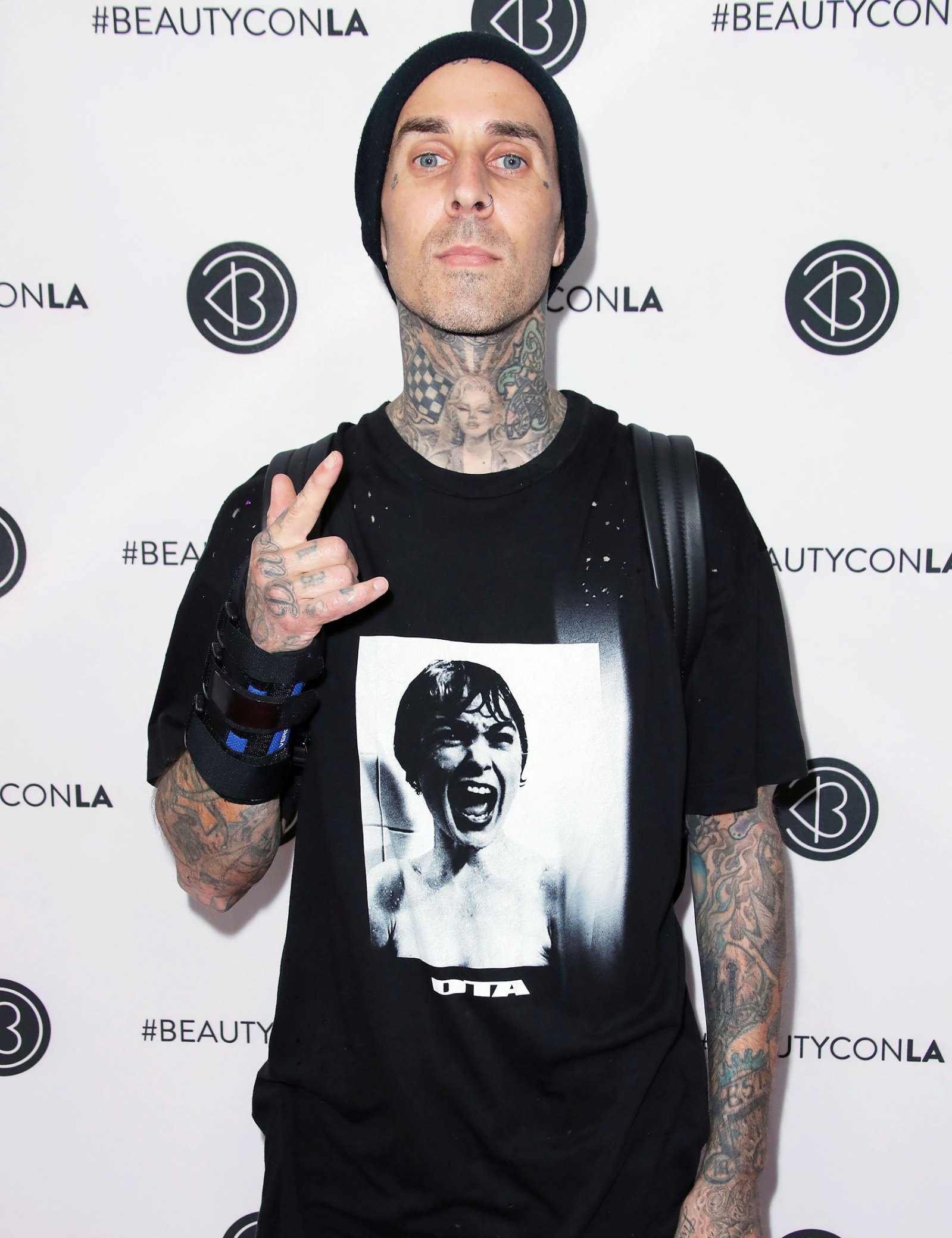 Another One! Travis Barker Gets ‘Survivors Guilt’ Inked on His Elbows