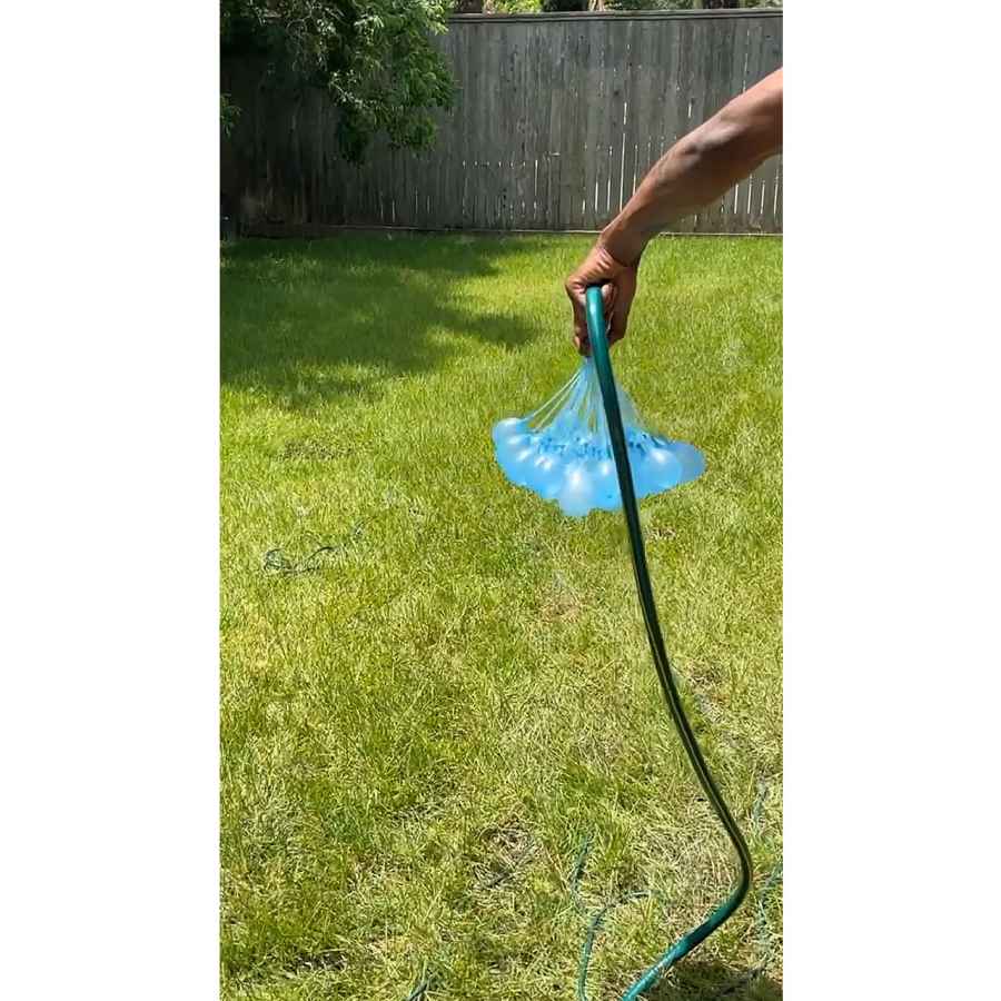 Kylie Jenner and Travis Scott Have Water Balloon Fight With Daughter Stormi Memorial Day 2