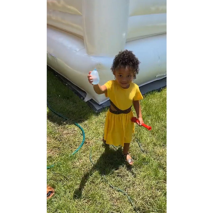 Kylie Jenner and Travis Scott Have Water Balloon Fight With Daughter Stormi Memorial Day 5