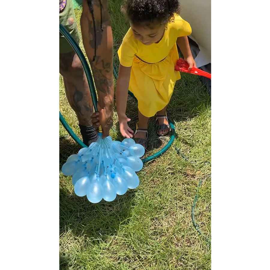 Kylie Jenner and Travis Scott Have Water Balloon Fight With Daughter Stormi Memorial Day 7