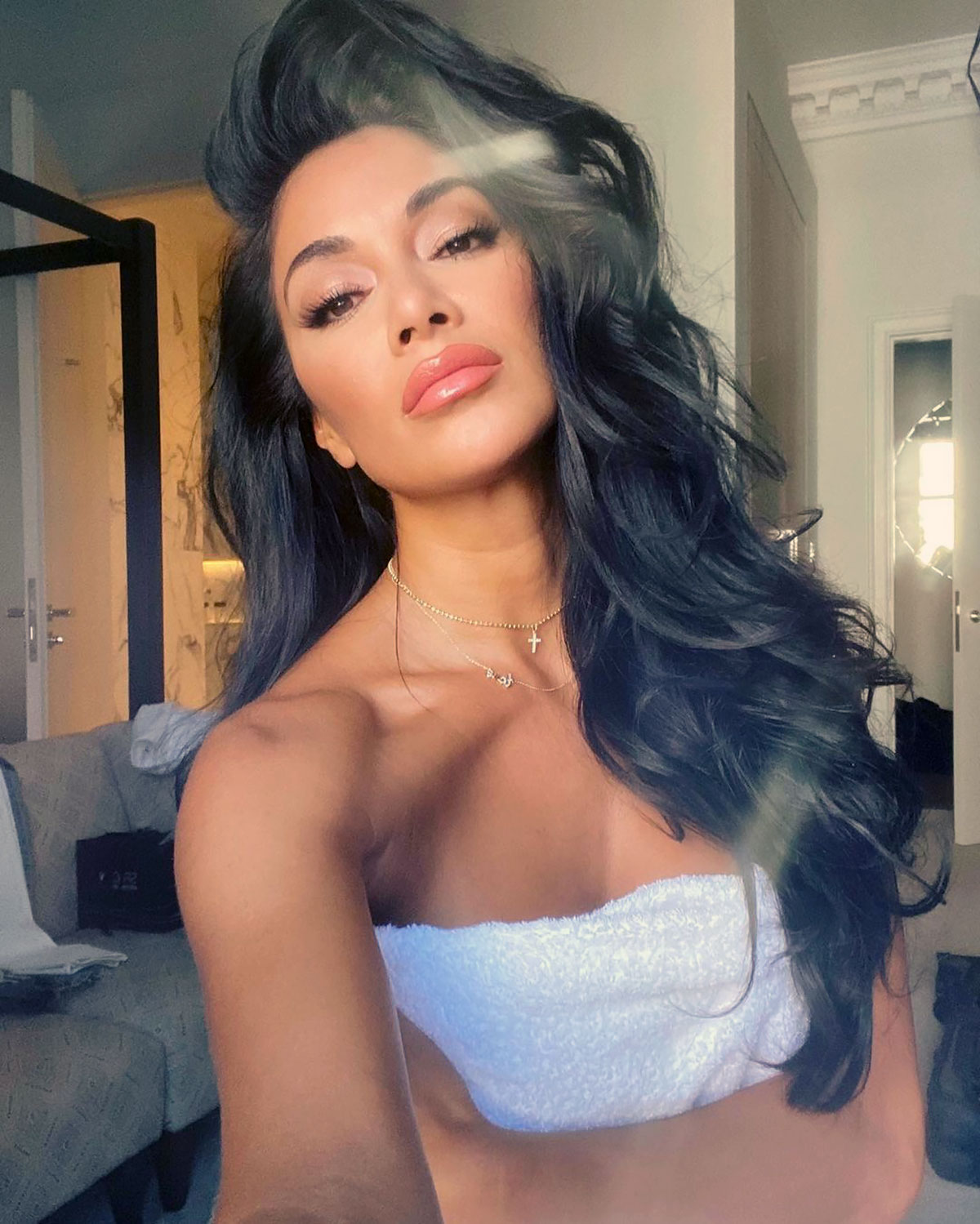 Nicole Scherzinger Gets ‘Dolled Up’ in Nothing But a Towel