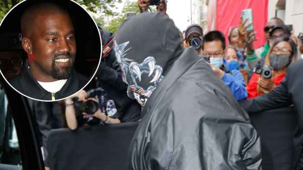 Kanye West Attends Balenciaga Fashion Show in Full Face Covering
