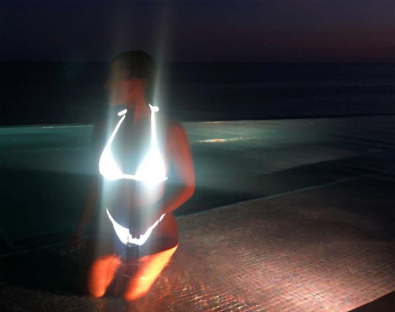 Kourtney Kardashian Lights Up Night Glow Dark Bikini