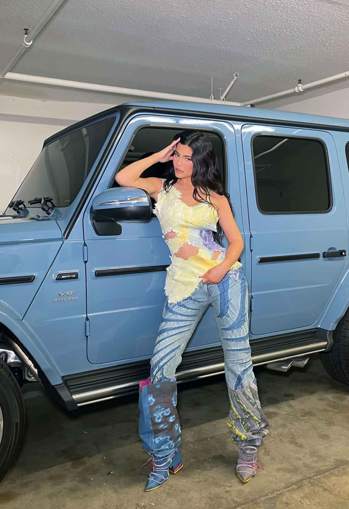 Kylie Jenner Wears Pink Accessories to Match the Interior of Her Car