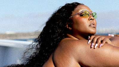 Lizzo Epitomizes Hot Girl Summer in Neon Green Cheetah-Print Bikini