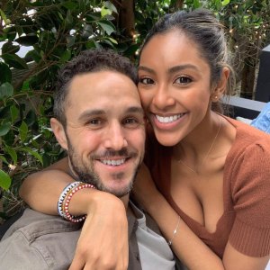 Tayshia Adams Zac Clark and I Arent Rushing Into Wedding Planning