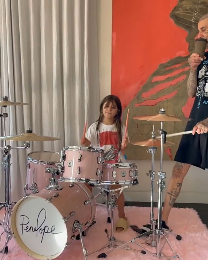 Travis Barker teaches Kourtney Kardashian's daughter Penelope how to play new drums 3