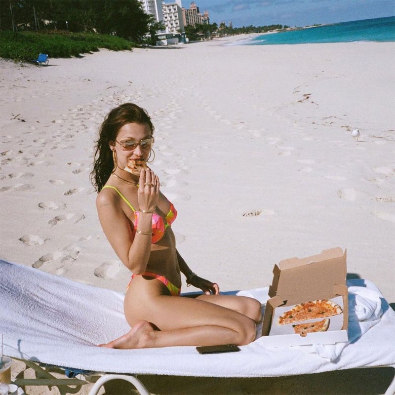 Bella Hadid Eating Pizza in a Tie-Dye Bikini