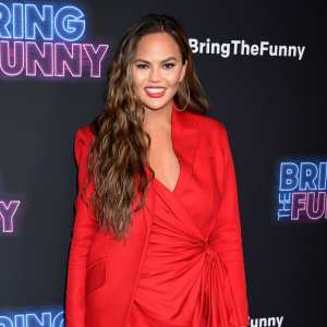 Chrissy Teigen Denies Theories That She Deletes Negative Comments From Her Social Media Red Dress